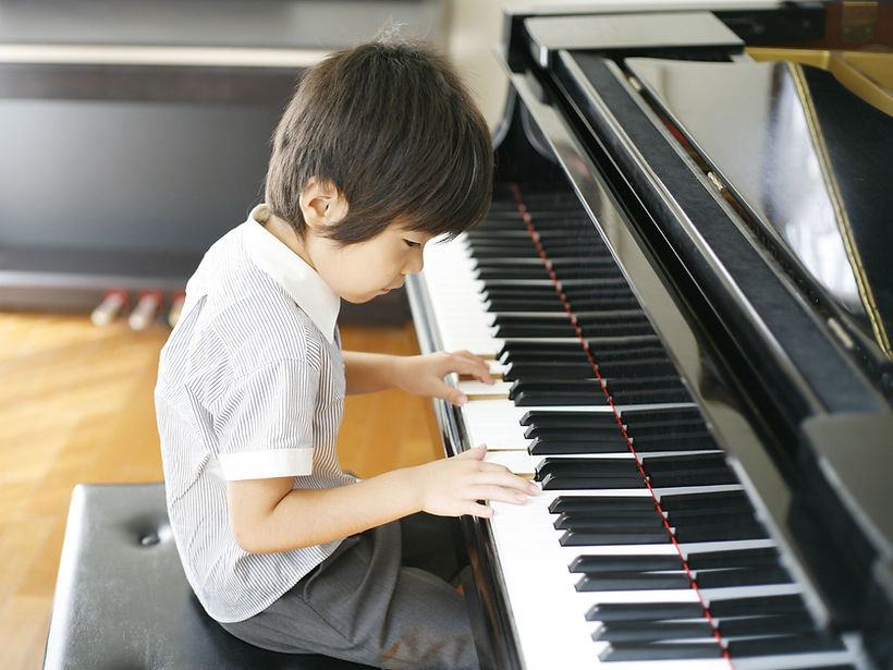 Young Boy Playing the Piano