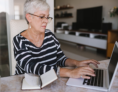 A Woman Writing at Home