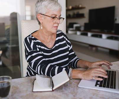 A Woman Writing at Home