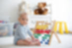 Baby Playing with Abacus