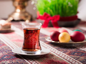 tablecloth with tea and fruit