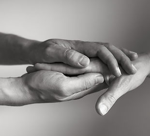 Hands offering support, symbolising the powerful support package provided by Lianne Hobbs Therapy for lasting transformation.