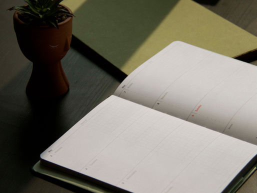 Open planner on a desk