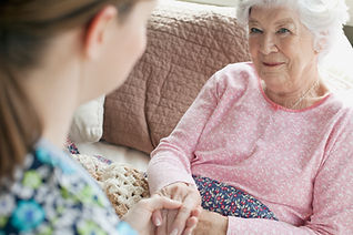 A home care nurse with elderly women