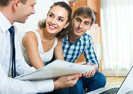 Happy clients talk to their investment advisor