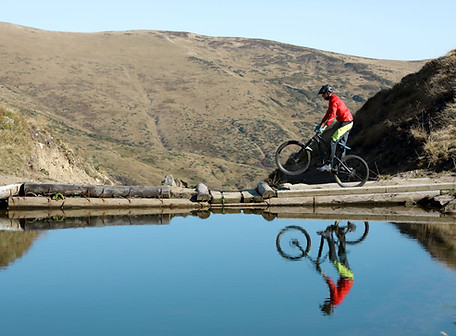 Reflection of Cyclist on Water