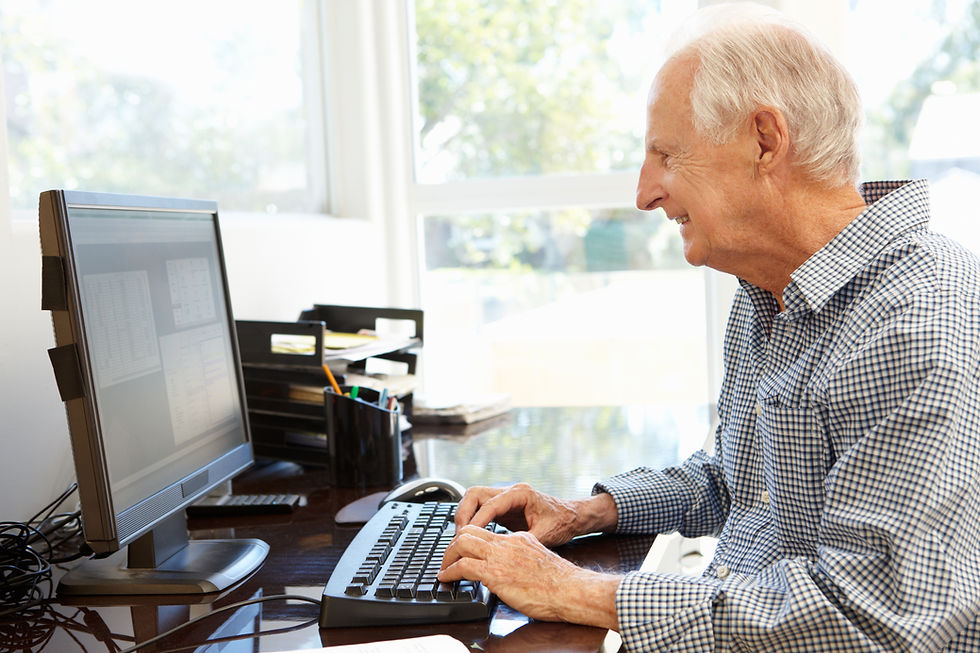 Senior Man Typing