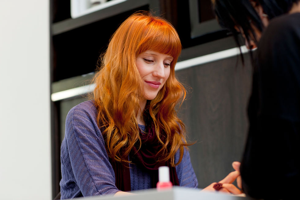 Woman Getting Manicure