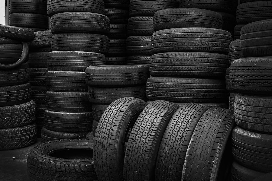 Full Frame Shot Of Stacked Car Tyres