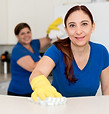 Women Cleaning Kitchen