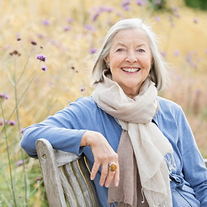Older woman sitting on park bench