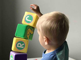 Kid playing bricks