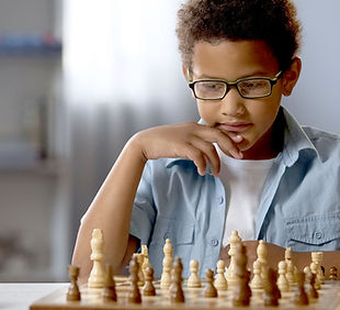 Boy Playing Chess