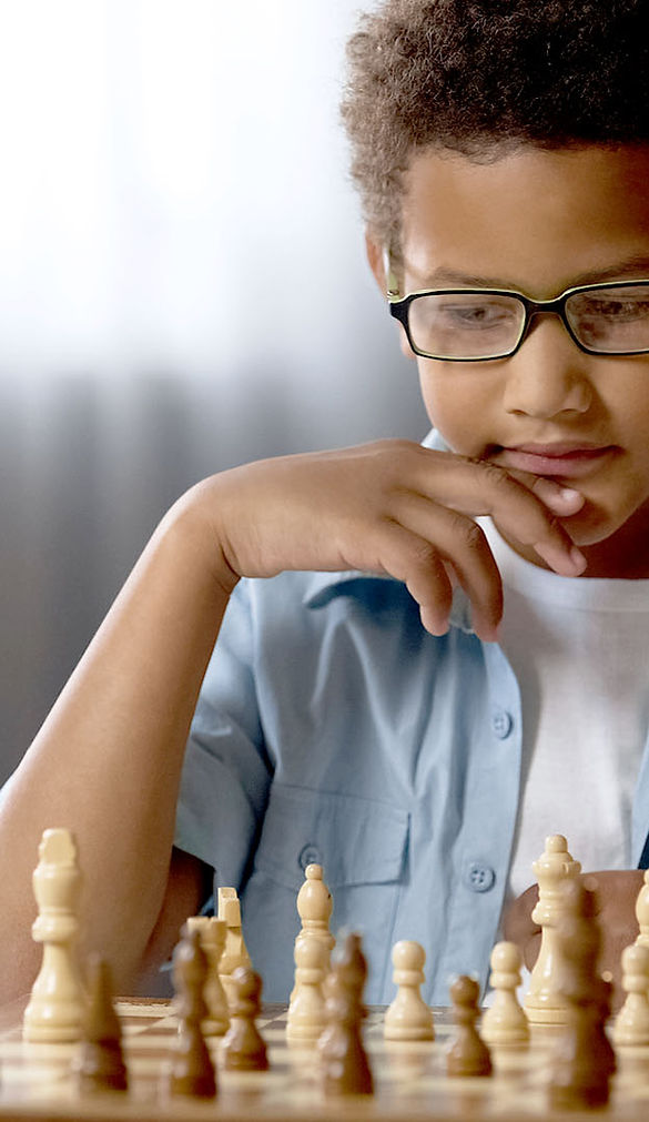Child Playing Chess