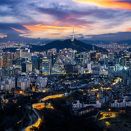 A New Era of Innovation Leadership South Korea has transformed from a war-torn, resource-poor country into one of the most advanced and innovative economies in the world. Its global leadership in sectors like semiconductors, artificial intelligence (AI), robotics, and consumer electronics is no accident. It's the result of strategic planning, targeted investment in research and development (R&D), and a growing ecosystem of startups and global collaborations. This article explores how South Korea continues to lead in innovation in 2025, the challenges it faces, and what lessons other nations can learn. The Foundation: Education, Exports, and R&D After the Korean War, South Korea focused on building its economy by investing in education and developing export-led industries. Within a decade, illiteracy dropped dramatically, and the nation shifted from exporting basic goods like textiles to advanced products like vehicles, semiconductors, and mobile devices. The government played a central role by supporting selected conglomerates (chaebols) such as Samsung, Hyundai, and LG. These family-owned giants received subsidies and regulatory support, driving the country’s export boom. At the same time, R&D intensity became a cornerstone of national policy. Government agencies, universities, and industry worked hand-in-hand to create a national innovation ecosystem. Innovation in 2025: South Korea's Strategic Focus Areas South Korea continues to lead globally in tech-driven innovation, particularly in the following sectors: 1. Artificial Intelligence (AI) South Korea is introducing new AI legislation aimed at balancing innovation with public trust. Investment in AI data centres and research is expanding, especially to support small and medium-sized enterprises (SMEs). Government-backed AI initiatives target healthcare, manufacturing, and smart city technologies. 2. Semiconductors. As a world leader in semiconductor manufacturing, South Korea is doubling down on investment to maintain its edge. With global demand surging for chips in AI, electric vehicles, and devices, companies like Samsung and SK Hynix are expanding their production capacities. 3. Robotics. South Korea boasts one of the highest robot densities in the world. By 2030, the government aims to deploy one million robots across sectors like logistics, agriculture, and elderly care, supporting productivity and quality of life. 4. Software-as-a-Service (SaaS). The SaaS market is booming, with events like the Korea Innovation Convergence Summit showcasing Korean startups and building bridges with the US tech ecosystem. Agile development and strong public investment are fuelling rapid growth. 5. Smart Ports. Incheon has become the first fully automated smart port, and Busan is undergoing major expansion. These ports integrate AI, 5G, and automation to boost logistics efficiency and trade competitiveness. 6. Public-Private Partnerships. The Korean government is championing public-private collaboration. Initiatives like the K-Startup Grand Challenge support both local and international entrepreneurs, providing funding, mentorship, and market access. 7. Global Collaboration. South Korea actively partners with other nations, particularly the US, to promote technology exchange and innovation growth. Major events like CES 2025 and APEC 2025 underline Korea’s leadership on the global stage. From Chaebols to Startups: A Mindset Shift While chaebols once dominated innovation, a new wave of startup growth is now reshaping Korea's economy. With the establishment of the Ministry of SMEs and Startups and programmes like TIPS, the startup ecosystem has taken off. Between 2017 and 2021, startup investment surged, and job creation by startups outpaced the four largest chaebols combined. Korean startups are not only thriving locally but succeeding globally—in fields from education and e-commerce to entertainment and AI. Startups now see chaebols not as competitors, but as collaborators. Corporate venture capital (CVC) is growing, with major firms investing in and acquiring innovative startups. This synergy is fostering a more dynamic innovation ecosystem. Youth, Culture, and Risk-Taking A cultural shift is underway. Generation Z in South Korea is turning away from traditional careers in law, medicine, and big corporations. Instead, they value flexibility, personal growth, and mission-driven work—all hallmarks of startup culture. Experienced professionals are also making the leap, leaving secure jobs at Samsung or LG to join or start startups. The mindset of embracing risk and innovation is becoming more common, helping build a vibrant tech ecosystem. Challenges to Innovation: Regulatory Constraints Despite its success, South Korea faces regulatory hurdles that could stifle innovation. The country uses a "positive regulation" model, which means activities are only allowed if explicitly permitted by law. This approach is compounded by "shadow regulations"—informal guidance that limits business flexibility. These systems have led to innovation bottlenecks. The TADA ride-sharing app, for example, was legal under existing laws but faced political and regulatory pushback, resulting in a ban. In the cryptocurrency sector, excessive regulation has driven many firms to relocate to places like Dubai and Singapore. If Korea wants to stay competitive, it must shift towards a "negative regulation" approach, where all actions are allowed unless specifically prohibited. This would encourage risk-taking and allow innovation to flourish without constant legal uncertainty. Crypto Innovation: A Missed Opportunity? South Korea has one of the world’s largest consumer markets for cryptocurrencies, but little industry innovation due to regulatory barriers. The crypto exchanges generate huge volumes, but companies are limited to basic services. Startups looking to innovate with stablecoins or blockchain solutions face endless red tape. By contrast, countries like the US allow experimentation and provide clearer guidelines. Without reform, Korea risks falling behind in this fast-moving sector. Government as an Enabler South Korea's innovation success has historically come from strong government support. Initiatives like KIST and KAIST have nurtured home-grown talent and tech. Strategic investments in broadband, regional innovation hubs, and R&D tax incentives have built a strong foundation. Today, the government must continue playing this enabling role by updating laws, streamlining approvals, and reducing bureaucratic drag. Creating an innovation-friendly regulatory environment is essential for continued growth. Key Takeaways and Recommendations for Other Countries Invest in Education and R&D : Human capital is Korea’s greatest asset. Countries should prioritise education, skills, and science funding. Promote Public-Private Collaboration : Cross-sector partnerships speed up innovation and commercialisation. Support Startups with Policy and Finance : Government incubators, funding, and tax incentives attract entrepreneurs. Modernise Regulations : Outdated or rigid rules discourage experimentation. A flexible approach, like negative regulation, can unlock innovation. Create Global Linkages : Hosting international events, forming trade alliances, and encouraging foreign investment strengthens national innovation ecosystems. Encourage Cultural Shifts : A mindset that embraces failure and experimentation is key to creating resilient innovation ecosystems. Staying Ahead in a Fast-Changing World South Korea is a global role model in how to build an innovative, tech-driven economy. Through education, infrastructure, startup support, and global engagement, it has moved from post-war poverty to global leadership. However, future success will depend on regulatory reform, deeper inclusion of foreign talent, and maintaining its cultural shift toward risk-taking and entrepreneurship. Other nations can look to South Korea as a blueprint for national innovation, adapting its lessons to fit their own context. To explore more insights on innovation and policy, subscribe to our expert articles at www.Georgejamesconsulting.com .