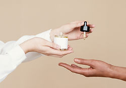 Hands Holding Serum