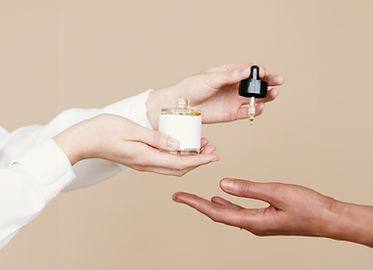 Hands Holding Serum