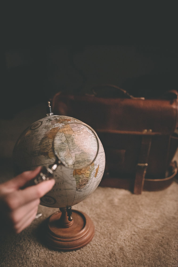 Globe And Magnifier