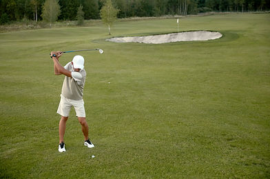 Man Playing Golf