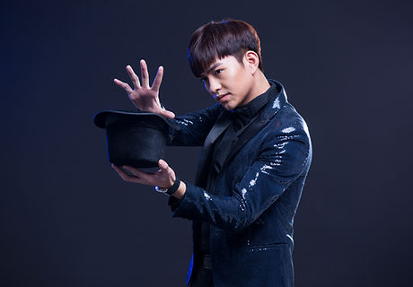 Magician Holding Magic Hat