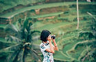 Atoreia hotel template - woman photographing landscape