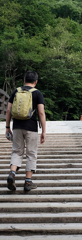 Man Walking on a Bridge