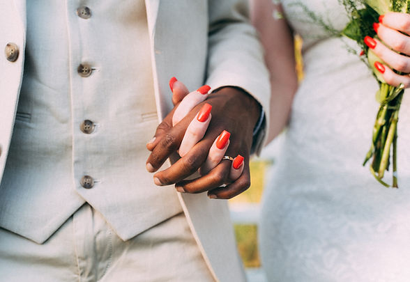 Interracial wedding hands
