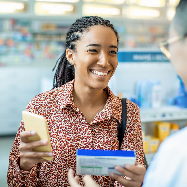 Woman at pharmacy counter