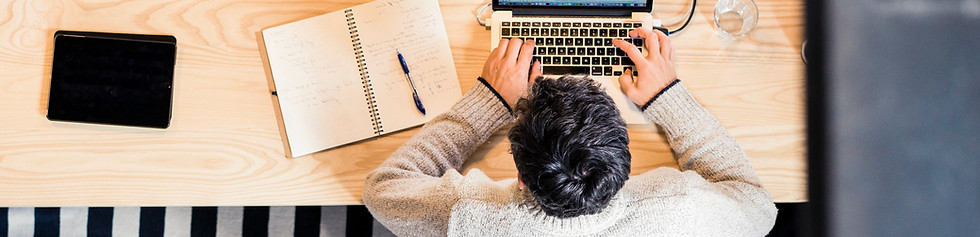 Typing on laptop