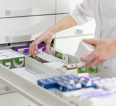 Pharmacist Stocking Medicines