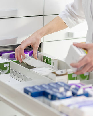 Pharmacist Stocking Medicines