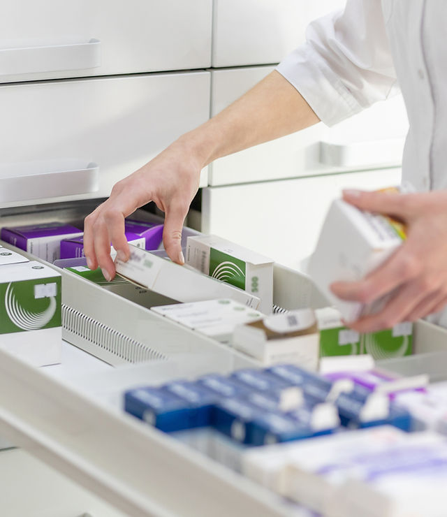 Pharmacist Stocking Medicines