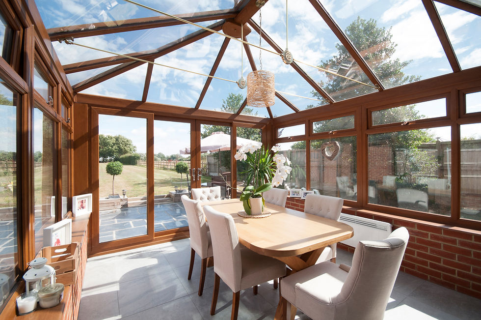 Modern conservatory dining room with lantern style roof
