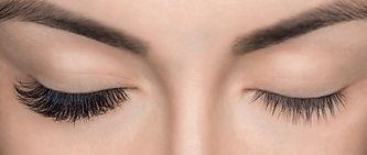 Woman with long curly eyelashes