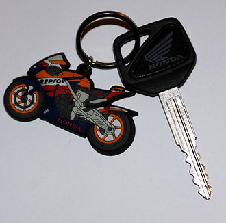 motogp Honda Repsol motorcycle Keyring attached to a Honda ignition key