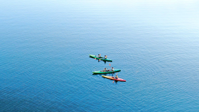 People Kayaking Group