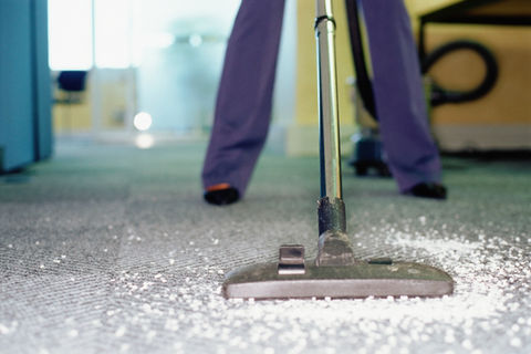 vacuum cleaner on white carpet