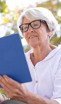 Woman Reading Outdoors