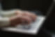 Typing on Laptop