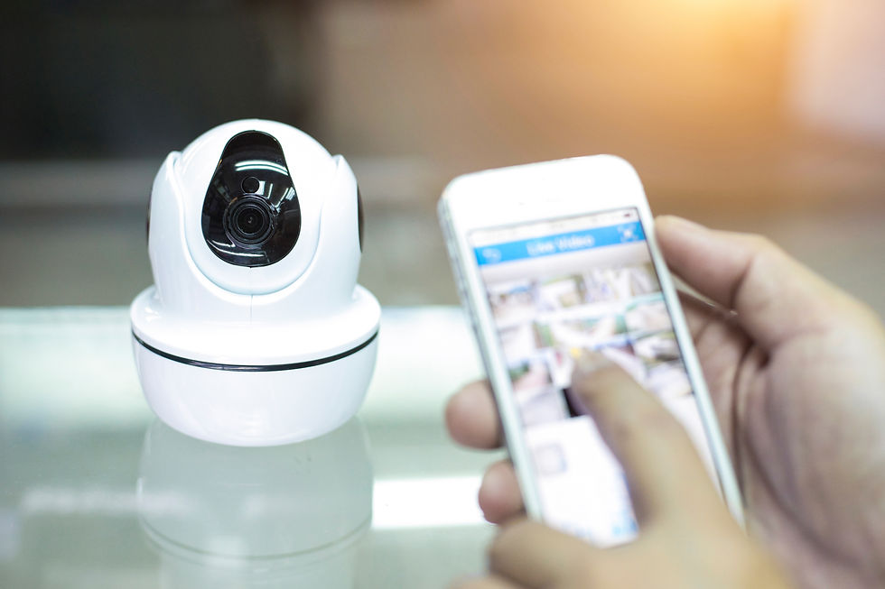 Hand pressing phone to watch CCTV