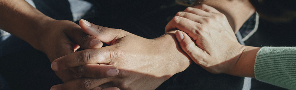 Closeup of comforting hands
