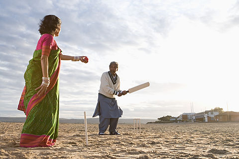 Playing Cricket on the Beach
