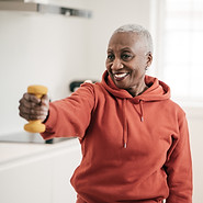 women doing light workout with a smile