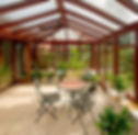 Conservatory with table, chairs and plants