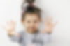 Little Girl Raising Her Hands