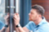 Locksmith installing a lock