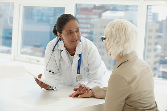 Doctor consulting a patient at Klinik Al-Ansar
