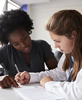 Teacher Helping Student
