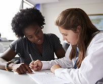 Teacher Helping Student