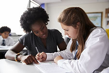 Teacher Helping Student